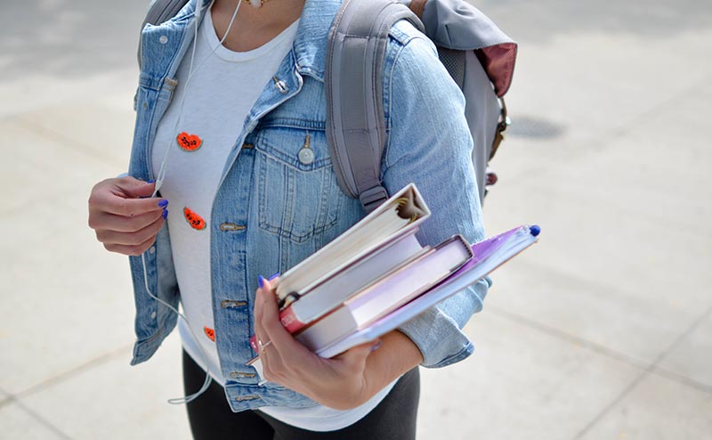 Learner with books